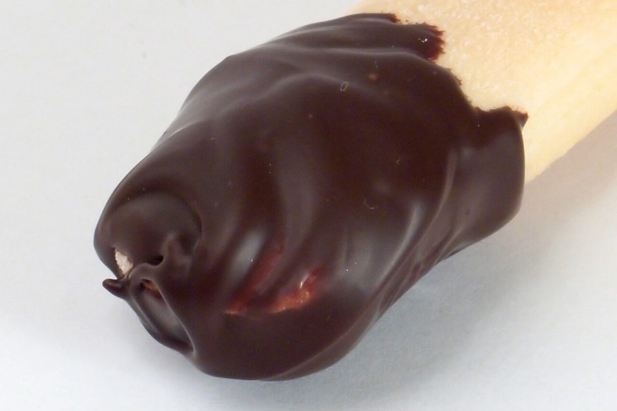 A glossy, properly tempered dark couverture chocolate sample