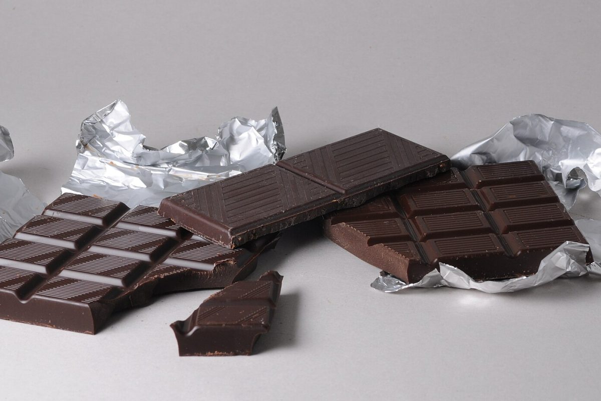 Three foil-wrapped dark chocolate bars